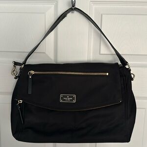 Black nylon/leather strap Kate Spade flap handbag. Great for work/travel.